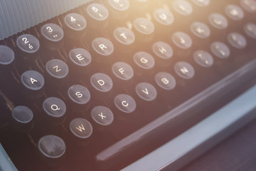 old dirty blue typewriter keyword detail