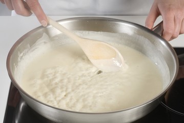 Making cream sauce for spaghetti