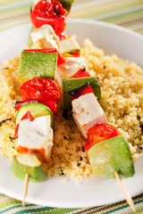 Grilled skewers over rice
