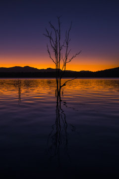 Beautifully rich coloured sunset on a winters evening at Lake Moogerah in Queensland, Australia