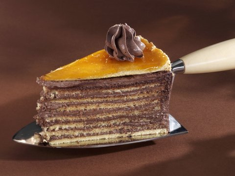 A Piece Of Dobos Torte On A Cake Server