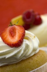 Two small cakes with fresh berries