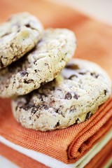 Chocolate chip cookies on orange napkin