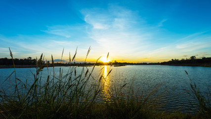 Fototapeta na wymiar Beautiful sunset at calm lake