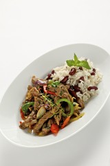 Beef with vegetables, beans and rice