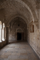 Fototapeta na wymiar Arches and walkway in the Church of the Nativity, Bethlehem, Israel