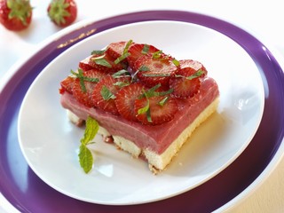 Strawberry and cream cheese slice on a plate