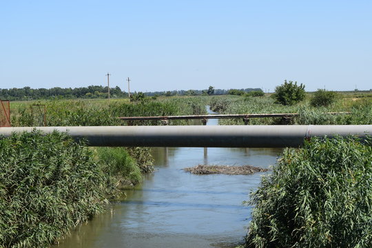 The gas pipeline through the small river