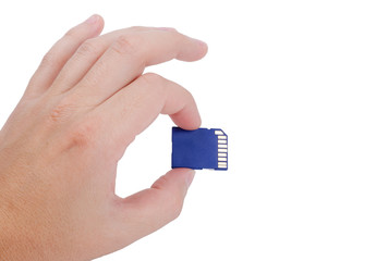 Flash media SD card in hand isolated on white background