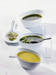 Three salad dressings: mustard; mustard, cheese and parsley; herb vinaigrette