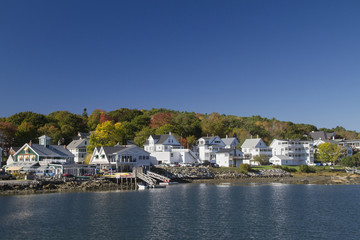 Coastal Maine shoreline with fall colors.Maine