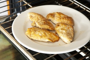 Chicken Marsala Keeping Warm in the Oven While Preparing Sauce