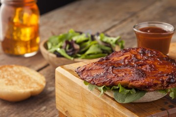Barbecue Chicken Sandwich; Salad; Iced Tea in a Mason Jar