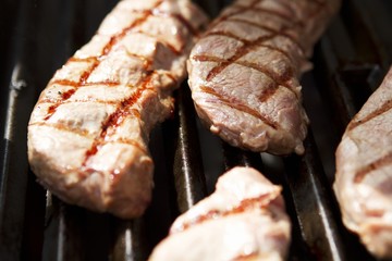 Veal steaks on a barbecue