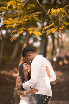 Indian Asian Malaysian couple enjoying each other's company
