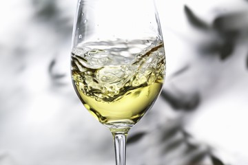 White wine swirling in a glass