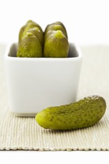 A bowl of cornichons