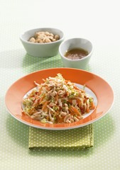 Sweet and spicy cabbage salad with peanuts and carrots