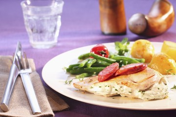 Chicken breast filled with cream cheese, with potatoes and green beans