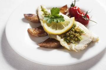 Trout fillet on potato wedges