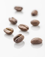 Fototapeta na wymiar Eight coffee beans