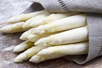 Poster White asparagus wrapped in a linen cloth © superfood