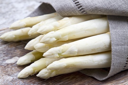 White asparagus wrapped in a linen cloth