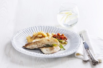Fish fillet with fried potatoes