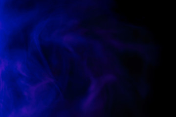 Abstract blue smoke hookah on a black background.