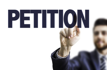 Business man pointing the text: Petition