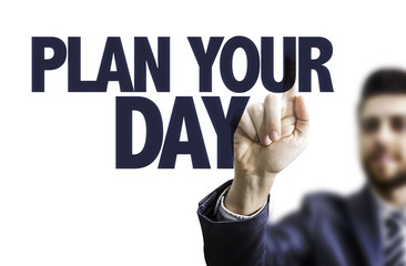 Business man pointing the text: Plan Your Day