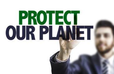 Business man pointing the text: Protect Our Planet