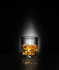 Luxury still life of whisky glass