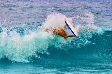 Young man boogie boarding, Maui, Hawaii, USA