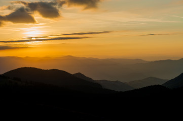 Fototapeta premium Sunrise over Carpathian mountains in Romania