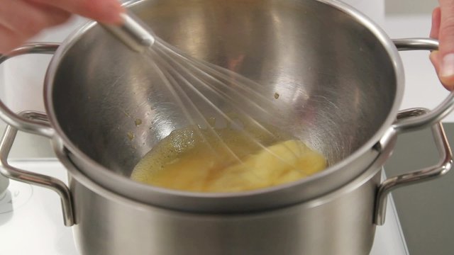 Bearnaise sauce being heated in a bain marie