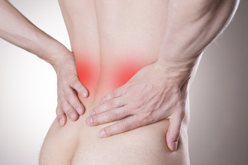 Kidney pain. Man with backache. Pain in the man's body