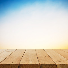 Naklejka na ściany i meble Wooden terrace on blue sky background