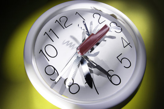 Multi-Purpose Tool on Wall Clock