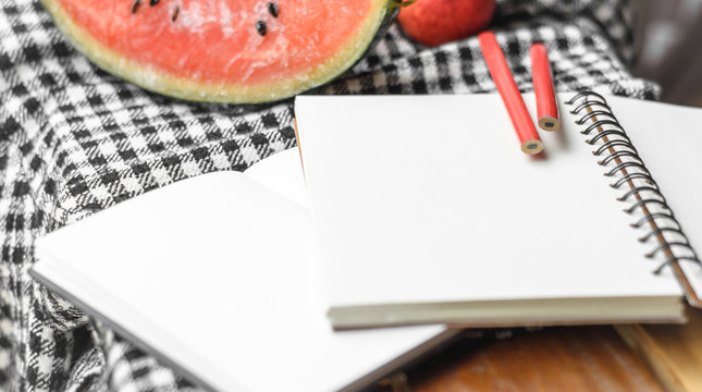 note book and pencil - Powered by Adobe