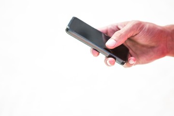 Close up hands sending a text message