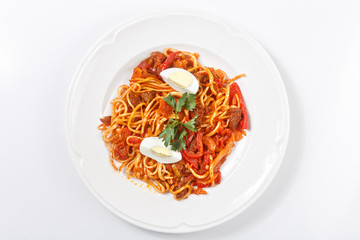 traditional uzbek lagman meal on white plate isolated