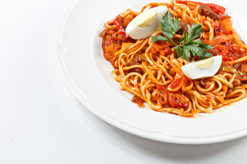 traditional uzbek lagman meal on white plate isolated
