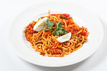 traditional uzbek lagman meal on white plate isolated