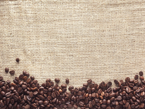 hessian and coffee beans - Stock Image