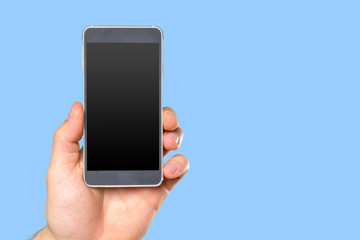 Man's hand holding smartphone