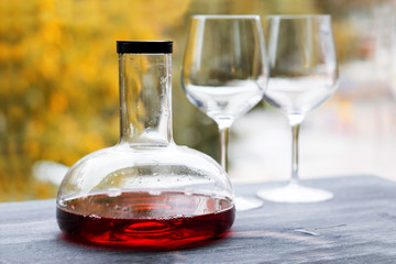 wine decanter and empty glasses 