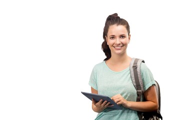 Composite image of happy student using tablet