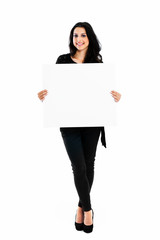 Young woman holding blank board