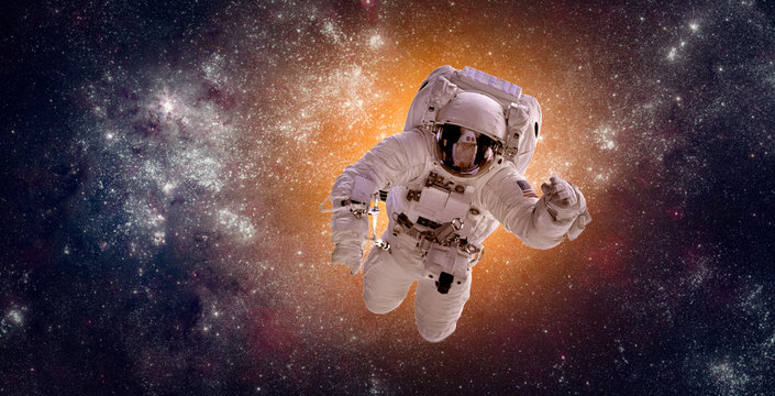 Fototapeta Astronaut in outer space